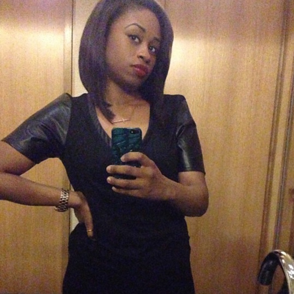 Faux leather sleeve v-neck top